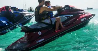 Simon Cowell on a Jetski with son Eric in Barbados