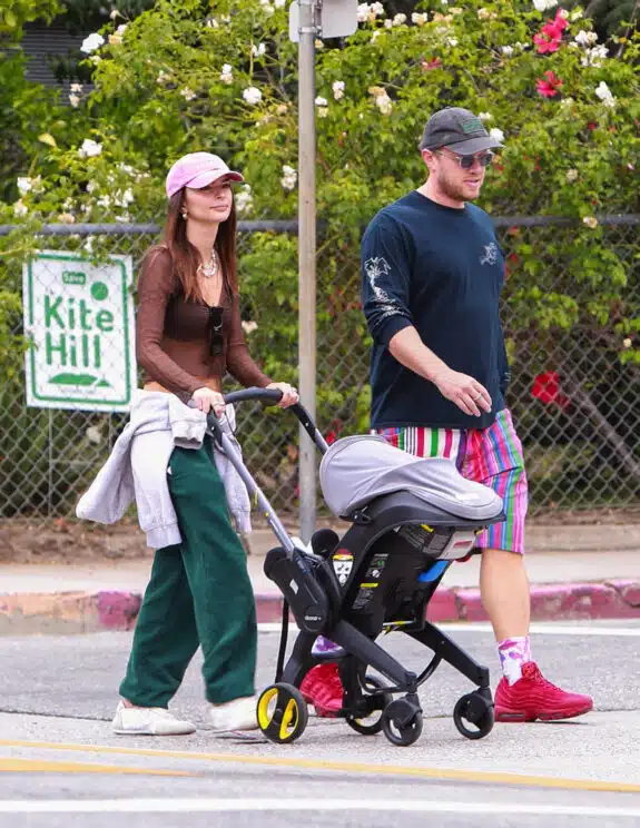 Emily Ratajkowski and Sebastian Bear-McClard step out with their baby for a Sunday stroll in LA Doona