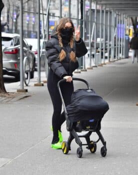 Gigi Hadid steps out in NYC with her baby in a Doona