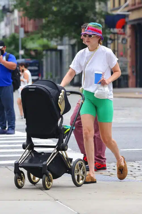 Model mom Gigi Hadid pictured during an outing with baby Khai in New York - cybex priam jeremy scott wings
