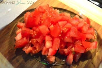 Homemade guacamole - diced tomatoes