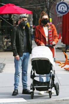 Parents Gigi Hadid and Zayn Malik enjoy an afternoon stroll with their daughter