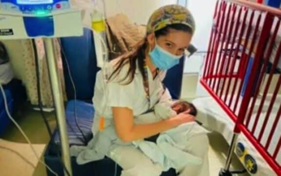 Yael Cohen nurses a baby in need