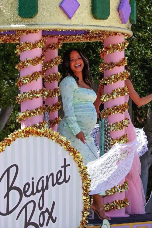 Pregnant Christina Milian poses for pictures at the grand opening of her Beignet Box Cafe in LA