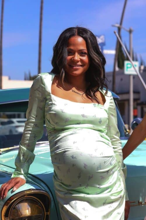 Pregnant Christina Milian poses for pictures at the grand opening of her Beignet Box Cafe in LA