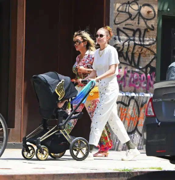 Gigi Hadid pushes Jeremy Scott wings stroller