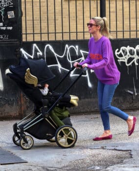 Nicky Hilton pushes Jeremy Scott wings stroller