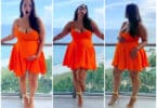 Pregnant Ashley Graham poses on her hotel balcony in Miami