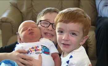 Newborn Finnley Patonai with brothers