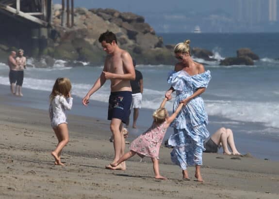 Nicky Hilton enjoys a happy day at the beach in Malibu with her husband James Rothschild and their kids Lily and Teddy.