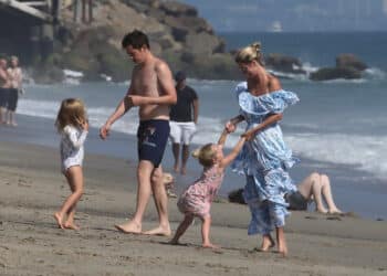 Nicky Hilton enjoys a happy day at the beach in Malibu with her husband James Rothschild and their kids Lily and Teddy.