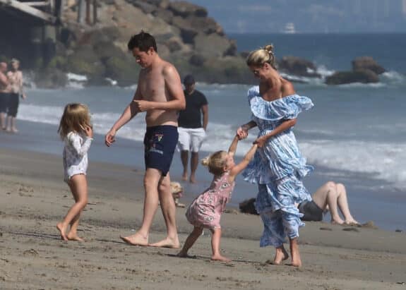 Nicky Hilton enjoys a happy day at the beach in Malibu with her husband James Rothschild and their kids Lily and Teddy.