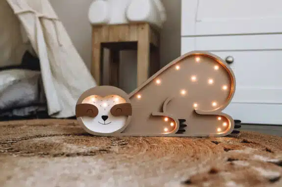 wooden sloth lamp