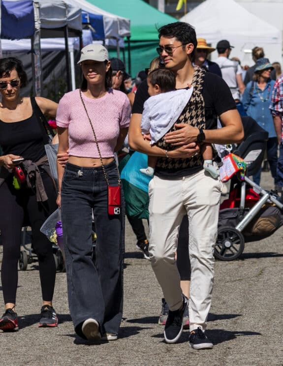 Actor Henry Golding and wife Liv Lo take their daughter out for some sunshine in Venice Beach
