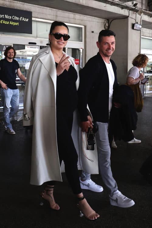 Pregnant Adriana Lima and Andre Lemmers arrive at Nice Cote d Azur airport ahead of Cannes