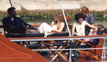 family on a boat in paris