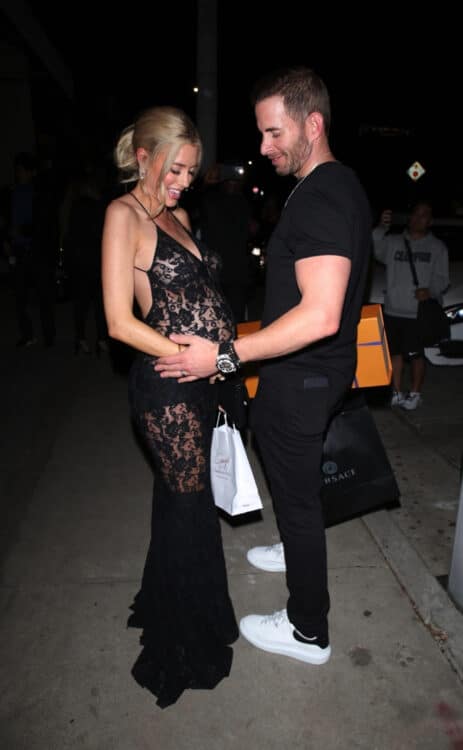 heather rae young pregnant wearing a lace black outfit leaving craigs restaurant with husband tarek