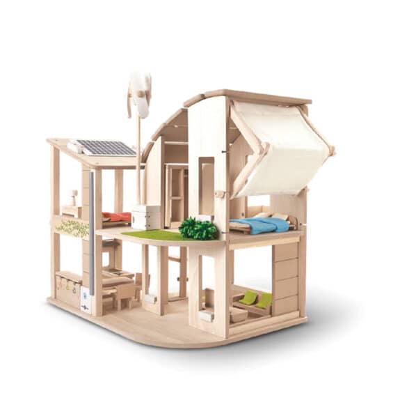 wooden dollhouse with solar panels, wind turbine and sustainable elements
