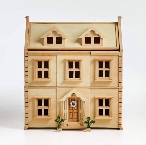 wooden victorian dollhouse with 2 floors and an attic