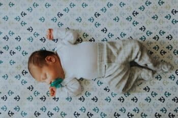 Peaceful baby sleeping in a crib