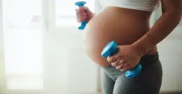 Pregnant woman taking care of her body during pregnancy