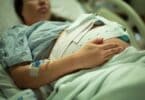 pregnant woman being monitored in the hospital