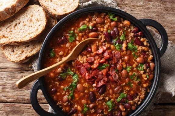 Crock pot beans with ground beef, bacon in a spicy sauce