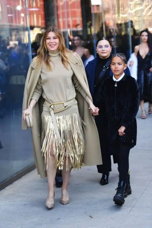 Ellen Pompeo and her daughter attend the Michael Kors fashion show during NYFW