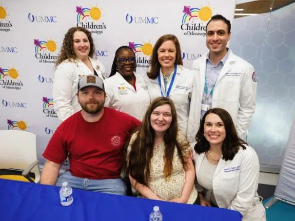 Shawn and Haylee are surrounded by a few members of their care team at UMMC and Childrens of Mississippi
