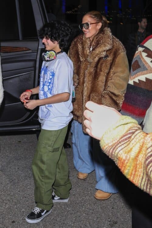 Emme Anthony walks with her mom Jennifer Lopez after SZA concert