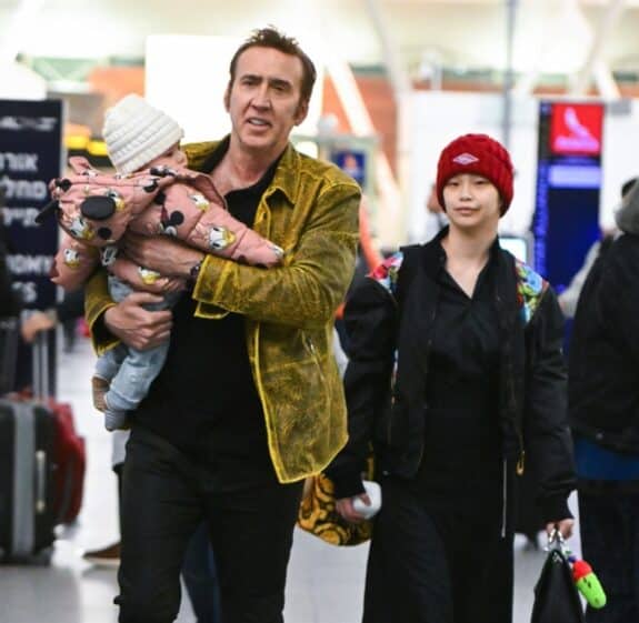 Nicolas Cage arrives at JFK airport with his wife Riko Shibata and daughter