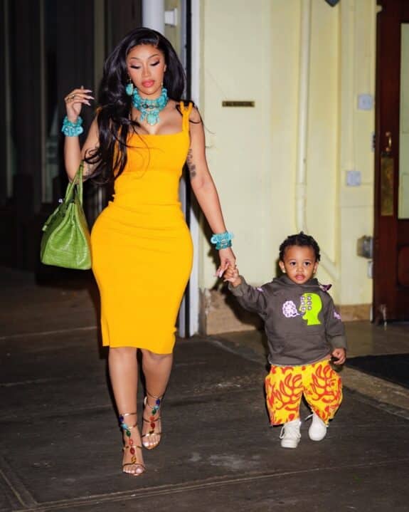 cardi b dressed in yellow walks with her kids and mom after leaving dinner
