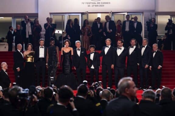 Indiana Jones and the Dial of Destiny cast descends the steps at the 76th Cannes International Film Festival