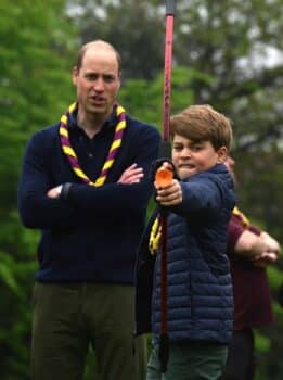 Prince william and prince George doing archery at the big help out