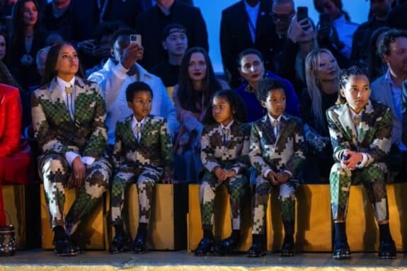 Pharrells wife Helen Lasichanh and 4 kids at Louis Vuitton show