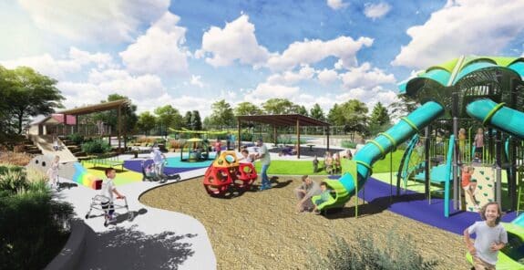 special needs park rendering showing kids engaging with the slides and spaces