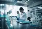 laboratory with scientists in lab coats conducting experiments