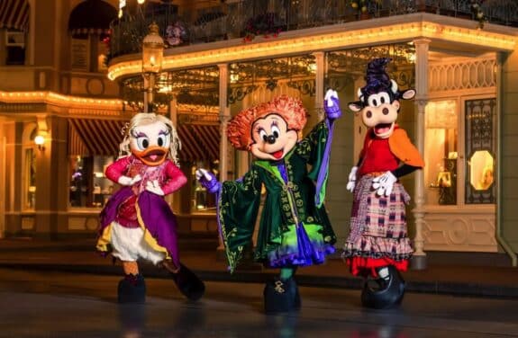 Minnie Mouse, Daisy Duck and Clarabelle Cow dressed as the Sanderson Sisters will make their debut this year in Mickeys Boo-To-You Halloween Parade at Mickeys Not-So-Scary Halloween Party
