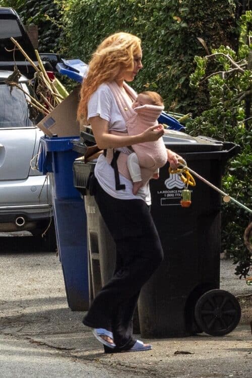 Rumer Willis and little Louetta take their pooch out for a stroll