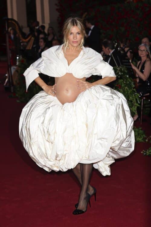pregnant Sienna Miller Reveals Her Bare Baby Bump in Schiaparelli on the Vogue World 2023 Red Carpet