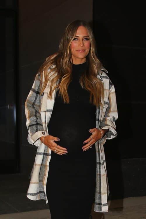 Pregnant country singer Jana Kramer poses for pictures after an event in SoHo
