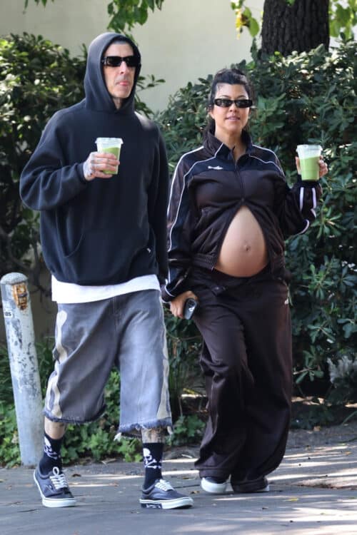 Pregnant Kourtney Kardashian with husband Travis Barker