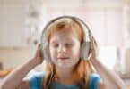 child listening to music