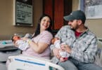 Kelsey holds Roxi while her husband, Caleb, holds Rebel.