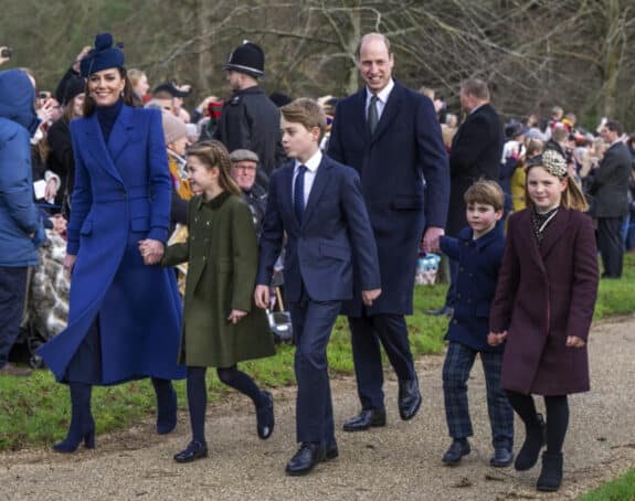 Prince George, William, Prince of Wales, Princess Charlotte, Mia Tindall and Kate, Princess of Wales walking to church christmas day 2023