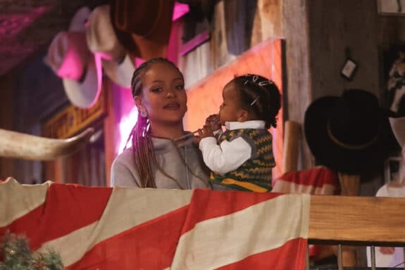 Rihanna holds son RZA as she shops at Kemo Sabe Aspen