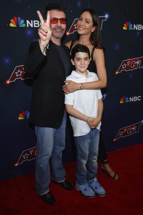 Simon Cowell, Eric Philip Cowell, and Lauren Silverman attend the red carpet for Americas Got Talent Season 18 Finale
