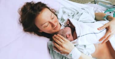 postpartum mom with baby