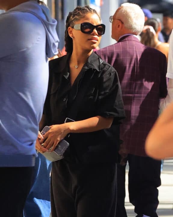 Pregnant Halle Bailey takes a stroll on Rodeo Dr before a Balenciaga visit in chic black outfit