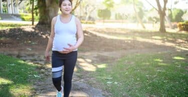 pregnant woman walking and workout in the park